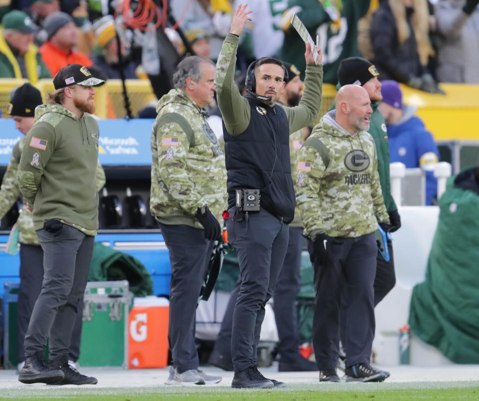Green Bay Packers head coach Matt LaFleur revs the crowd up during the first half of their game at Lambeau Field in Green Bay on Sunday, Nov. 14, 2021.   Photo by Mike De Sisti / Milwaukee Journal Sentinel via USA TODAY NETWORK