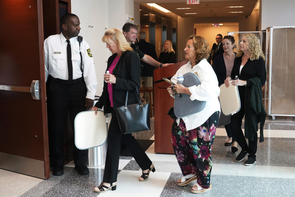 Relatives and family members of those injured or killed arrive for the death penalty trial for convicted Florida school shooter Nikolas Cruz at the Broward County Judicial Complex, Thursday, July 21, 2022, in Fort Lauderdale, Fla. (AP Photo/Marta Lavandier, Pool)