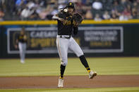 Pittsburgh Pirates' Oneil Cruz fields a ground hit hit by Arizona Diamondbacks' Alek Thomas during the first inning of a baseball game, Monday, Aug. 8, 2022, in Phoenix. (AP Photo/Matt York)