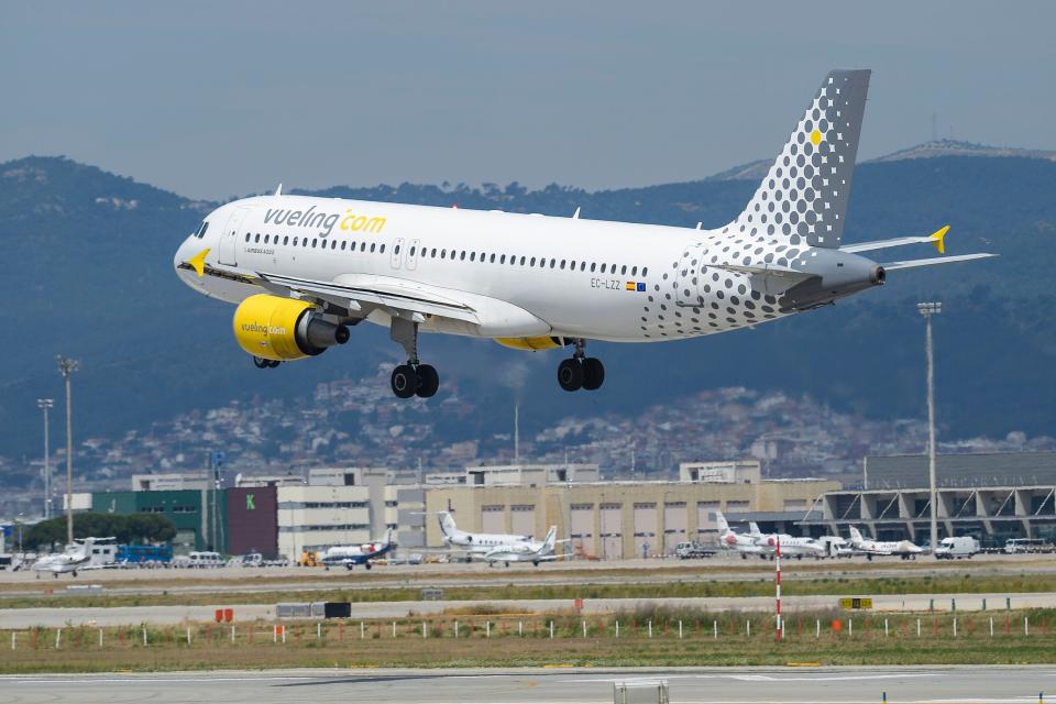 An airplane of the Spanish low-cost airline Vueling lands at Barcelona's airport in El Prat de Llobregat on June 6, 2016. (JOSEP LAGO/AFP/Getty Images)