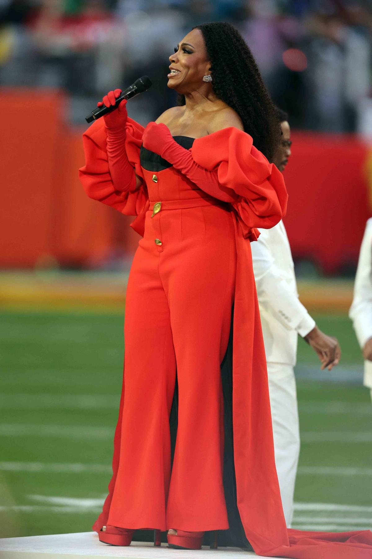 Sheryl Lee Ralph Wore a Stunning Red Jumpsuit to Perform at the Super Bowl