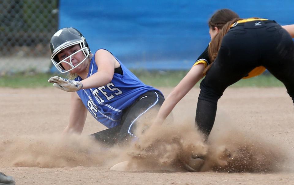 Pearl River's Brigitte Collins (2) is tagged out at second by Nanuet's Ashley Moliterno (2) after she tried to stretch a single into a double after driving in 3-runs during softball action at Pearl River High School May 11, 2022. Pearl River won the game 15-0.