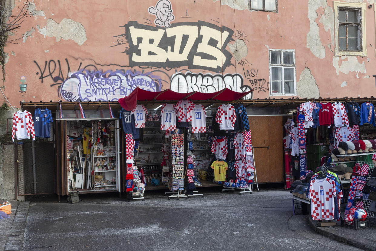 Croatia's national soccer team jerseys are seen on sale at an open air market ahead of the team's Qatar World Cup soccer semifinal match against Argentina, in Zagreb, Croatia, Tuesday, Dec. 13, 2022. (AP Photo/Marko Drobnjakovic)