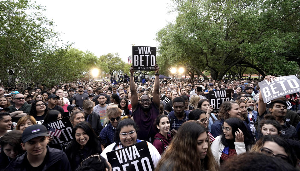 A supporter holds up a sign as he waits for Democratic presidential candidate and former Texas congressman Beto O'Rourke to take the stage for his presidential campaign kickoff rally in Houston, Saturday, March 30, 2019. (AP Photo/David J. Phillip)