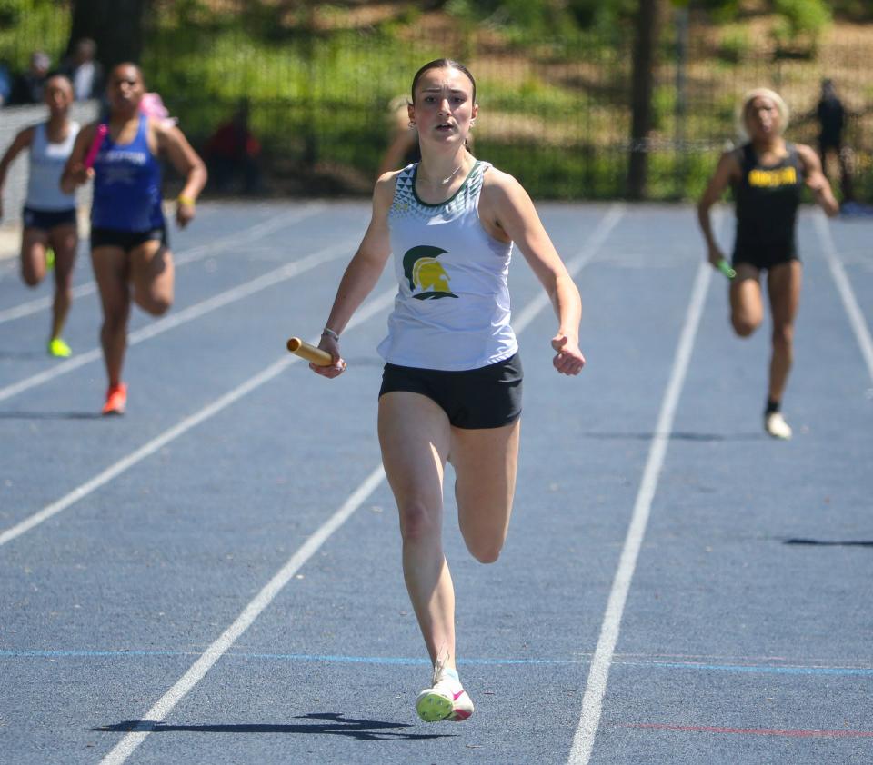 Saint Mark's Reagan Garibaldi anchors her team in its winning effort in the 4x200 meter relay during the New Castle County track and field championships, Saturday, May 11, 2024 at Abessinio Stadium.