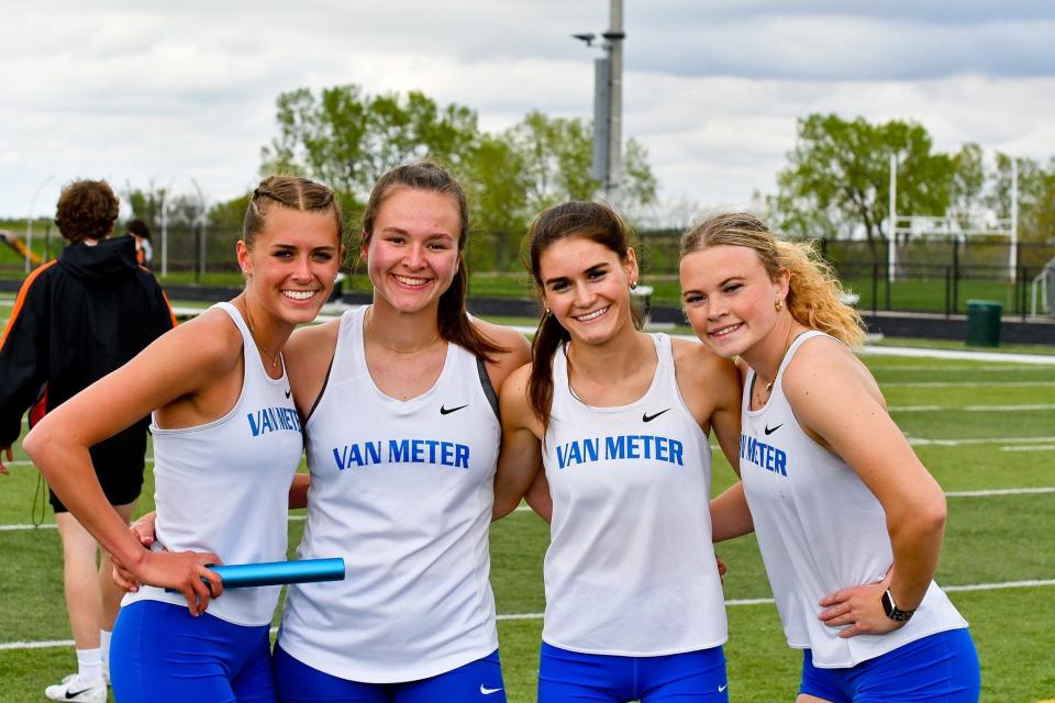 Van Meter's 4x400 relay team poses for a photo after winning a title during the West Central Activities Conference meet.