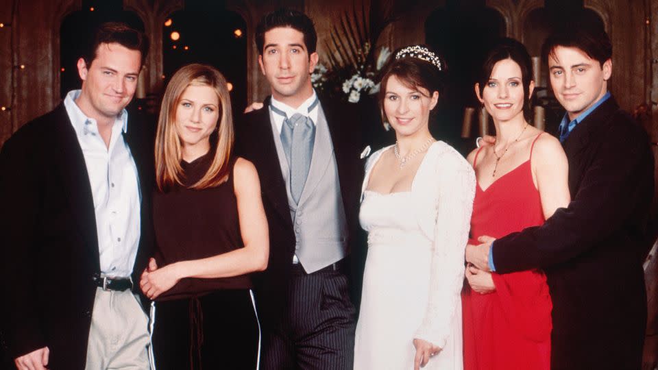 Matthew Perry as Chandler Bing, Jennifer Aniston as Rachel Green, David Schwimmer as Ross Geller, Helen Baxendale as Emily Waltham, Courteney Cox as Monica Geller, Matt LeBlanc as Joey Tribbiani.  - Oliver Upton/NBCU Photo Bank/Getty Images