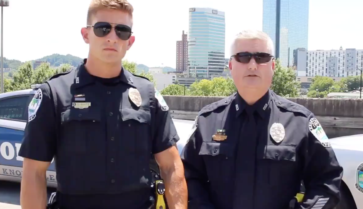 Social media users couldn't stop commenting on Officer Derrick White (left) while he attempted to inform drivers of the new Hands Free Law, which went into effect on Monday in Tennessee. (Photo: Twitter)