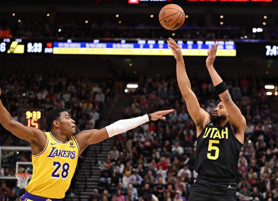 Utah Jazz guard <a class="link " href="https://sports.yahoo.com/nba/players/6234/" data-i13n="sec:content-canvas;subsec:anchor_text;elm:context_link" data-ylk="slk:Talen Horton-Tucker;sec:content-canvas;subsec:anchor_text;elm:context_link;itc:0">Talen Horton-Tucker</a> (5) drops in a 3-point shot over Los Angeles Lakers forward Rui Hachimura (28) as the Utah Jazz and the Los Angeles Lakers play at the Delta Center in Salt Lake City onWednesday, Feb. 14, 2024. | Scott G Winterton, Deseret News