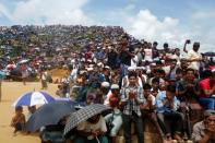 Rohingya refugees take part in a prayer as they gather to mark the second anniversary of the exodus at the Kutupalong camp in Cox’s Bazar