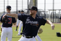 Newly acquired Atlanta Braves relief pitcher Will Smith throws during spring training baseball camp Thursday, Feb. 13, 2020, in North Port, Fla. (AP Photo/John Bazemore)