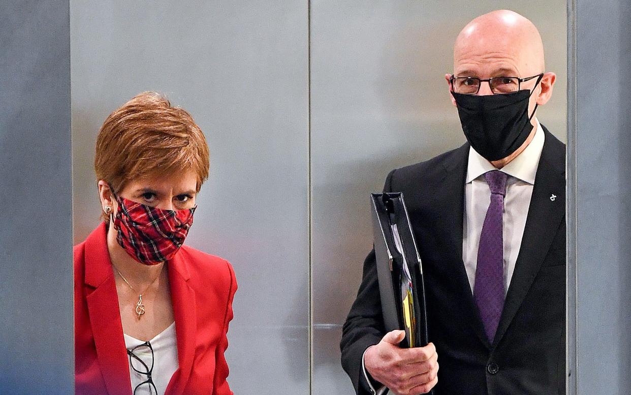 John Swinney, right, admitted contingencies were being looked at -  Jeff J Mitchell/Getty