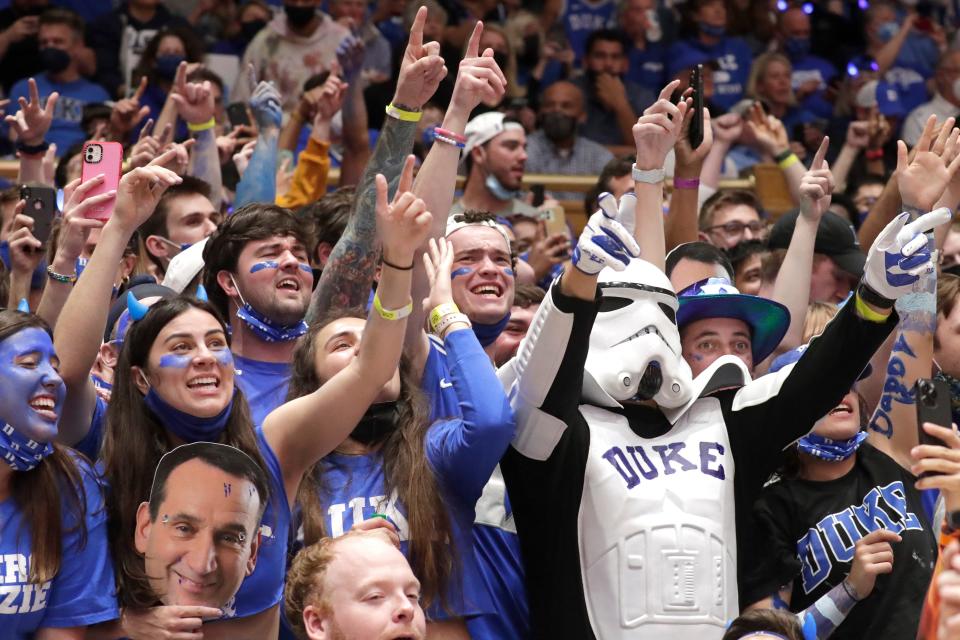 Duke fans cheer prior to the team's NCAA college basketball game between against North Carolina in Durham, N.C., Saturday, March 5, 2022.