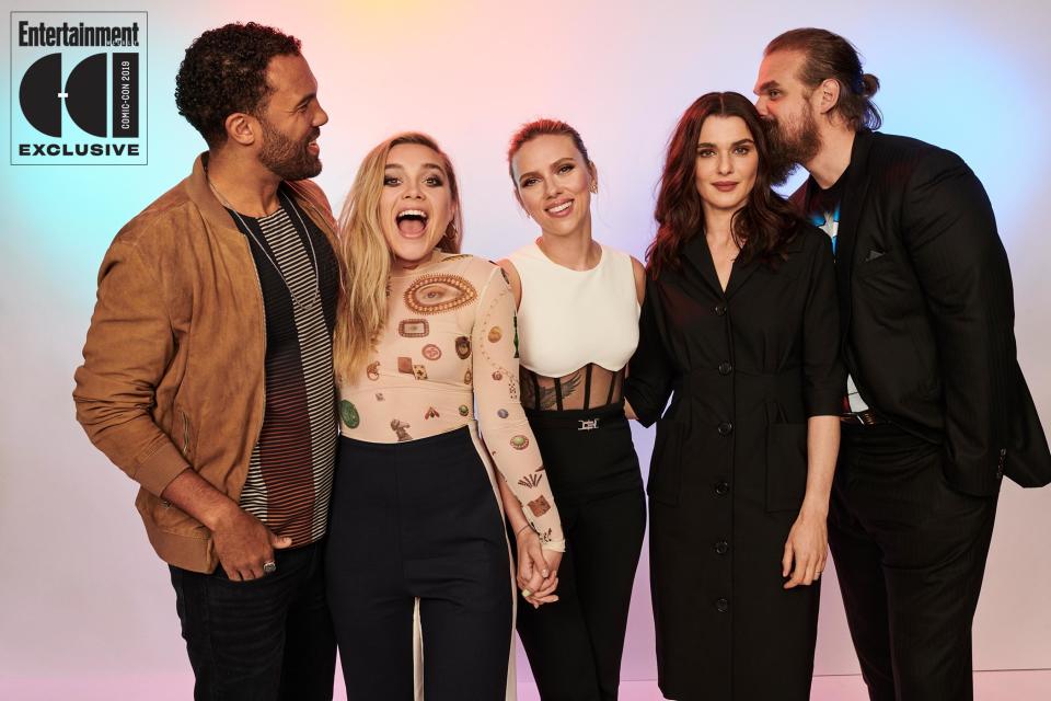 O. T. Fagbenle, Florence Pugh, Scarlett Johansson, Rachel Weisz, and David Harbour took a break from shooting to give audiences more details about the long-awaited solo film for the original Avengers member. After the <a href="https://ew.com/events/comic-con/" rel="nofollow noopener" target="_blank" data-ylk="slk:Marvel Comic-Con 2019;elm:context_link;itc:0;sec:content-canvas" class="link ">Marvel Comic-Con 2019</a> panel, the <em>Black Widow </em>stars provided EW with some <a href="https://ew.com/comic-con/2019/07/21/marvel-black-widow-exclusive-details-cast/" rel="nofollow noopener" target="_blank" data-ylk="slk:exclusive scoops;elm:context_link;itc:0;sec:content-canvas" class="link ">exclusive scoops</a> about what we can expect from the prequel movie, due out May 1, 2020.