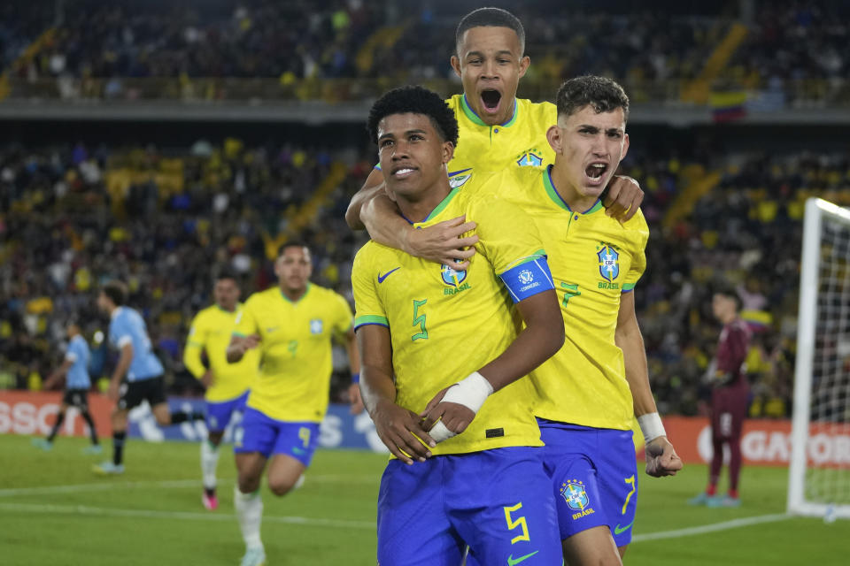FILE - Brazil's Andrey Dos Santos, center, celebrates with teammates after scoring his side's opening goal against Uruguay during a South America U-20 soccer match in Bogota, Colombia, Feb. 12, 2023. The 2023 Under-20 World Cup tournament will kick off in Argentina on May 20. (AP Photo/Fernando Vergara, File)