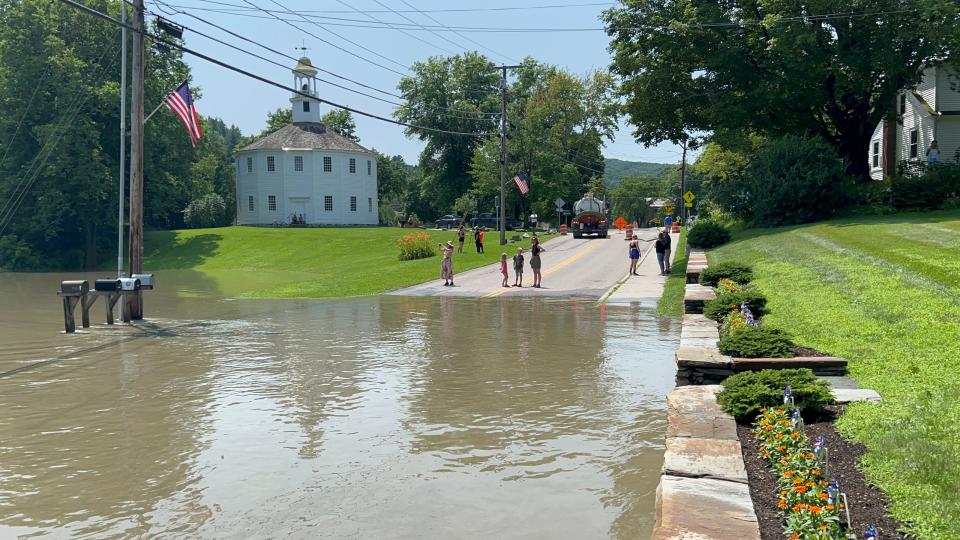 Waters reached up near the Round Church in Richmond as onlookers marveled at the sight on July 11, 2023.