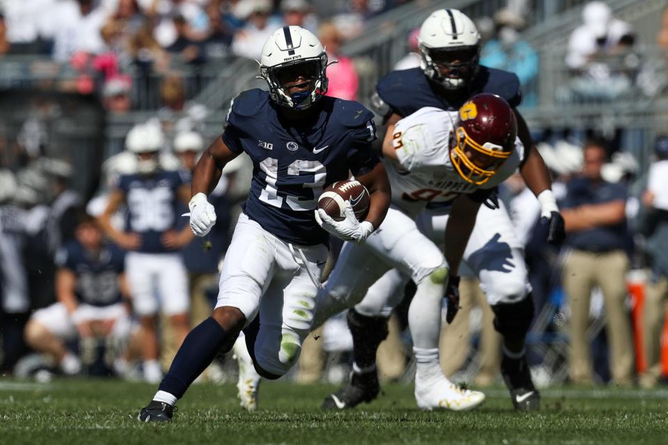 Penn State running back Kaytron Allen (13) runs with the ball during the second quarter against Central Michigan at Beaver Stadium.
