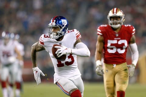 New York Giants wide receiver Odell Beckham (13) runs with the ball after making a catch against the San Francisco 49ers in the third quarter at Levi's Stadium - Credit: Cary Edmondson/USA Today