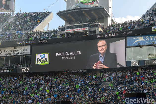 The Seahawks honored late owner Paul Allen with a tribute video and special 12th Man flag raising before a game against Los Angeles. (GeekWire Photo / Kevin Lisota)