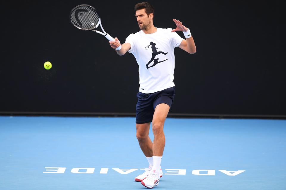 Novak Djokovic plays a forehand on centre court during a media opportunity ahead of the 2023 Adelaide International at Memorial Drive on December 28, 2022 in Adelaide, Australia.