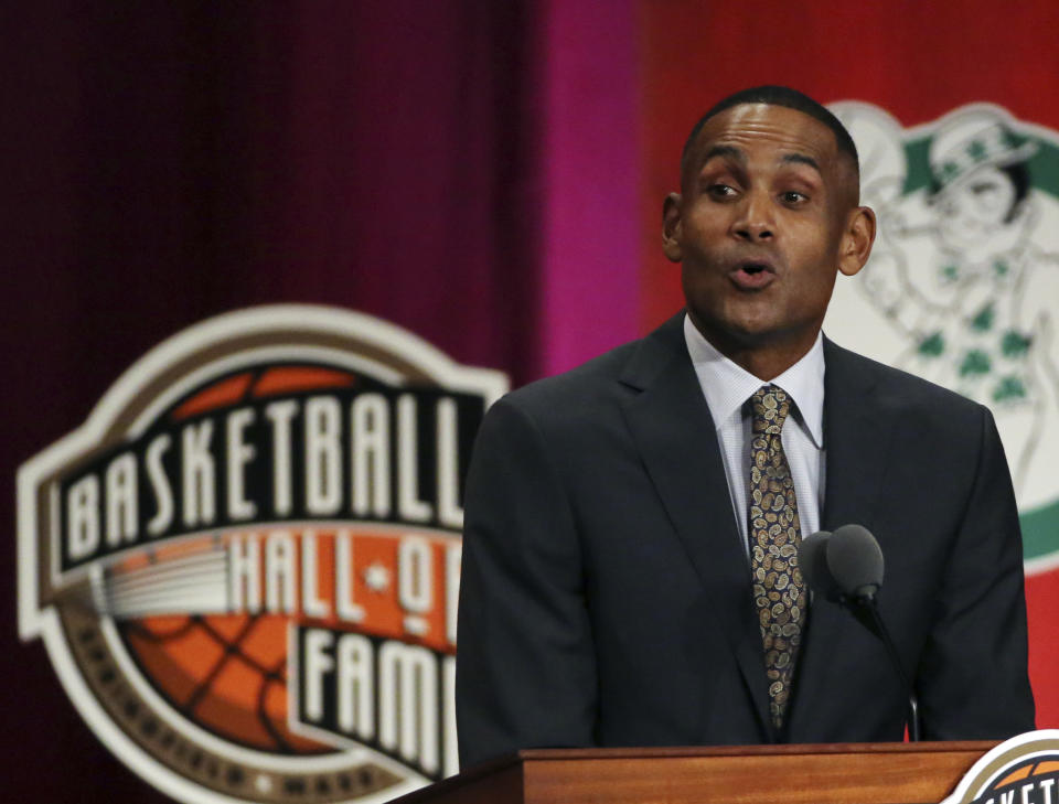 Grant Hill speaks during induction ceremonies at the Basketball Hall of Fame, Friday, Sept. 7, 2018, in Springfield, Mass. (AP Photo/Elise Amendola)