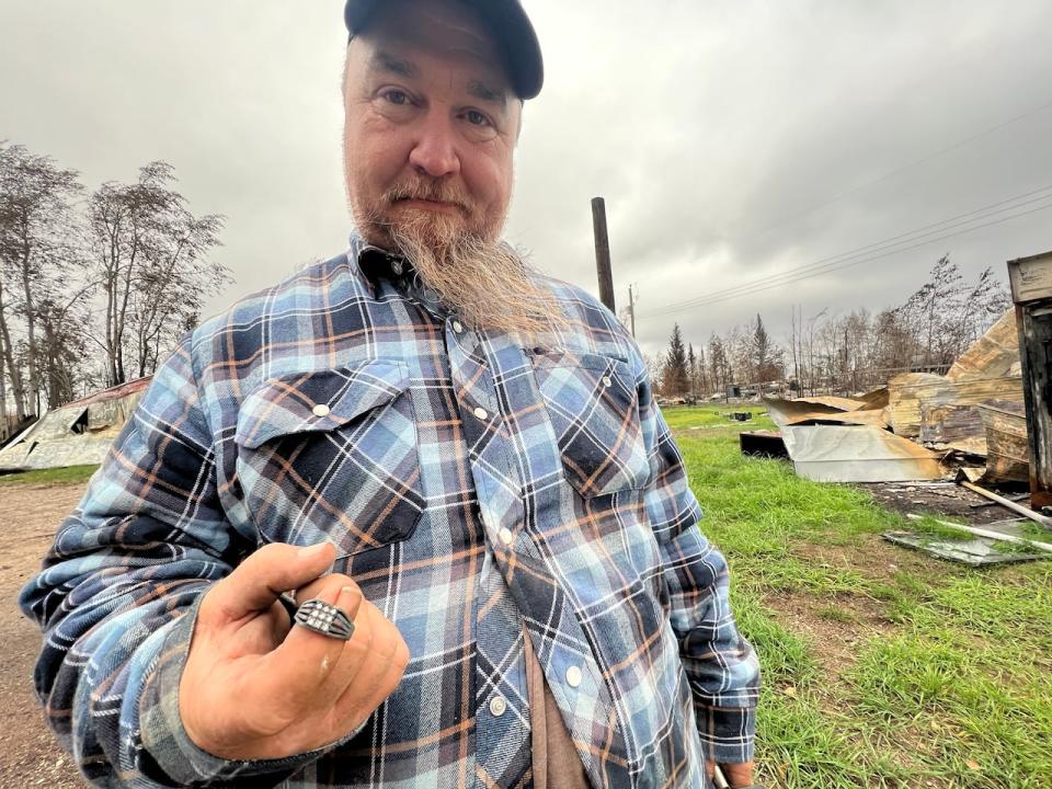 Paul Flamand was able to recover some possessions, such as this ring, in the ashes left of his home in Enterprise, N.W.T.