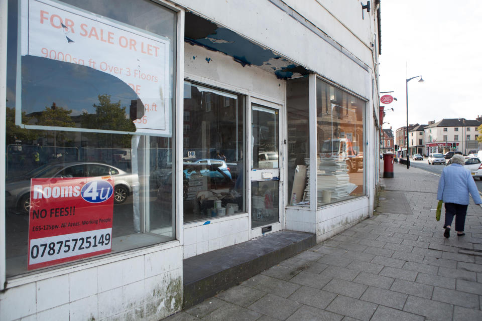 Local shopkeepers say a lack of free parking and double yellow lines is a big problem for the town (SWNS.com)