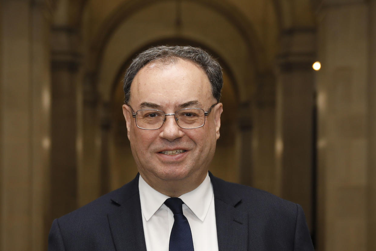 The new Bank of England Governor Andrew Bailey poses for a photograph on the first day of his new role at the central bank in London, Monday March 16, 2020. Andrew Bailey is replacing Mark Carney. (Tolga Akmen/Pool via AP)