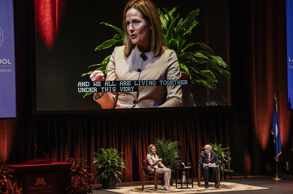 U.S. Supreme Court Justice Amy Coney Barrett speaks with Professor Robert A. Stein at Northrop Auditorium as part of the Stein Lecture Series in Minneapolis, Monday, Oct. 16, 2023. (Richard Tsong-Taatarii/Star Tribune via AP)