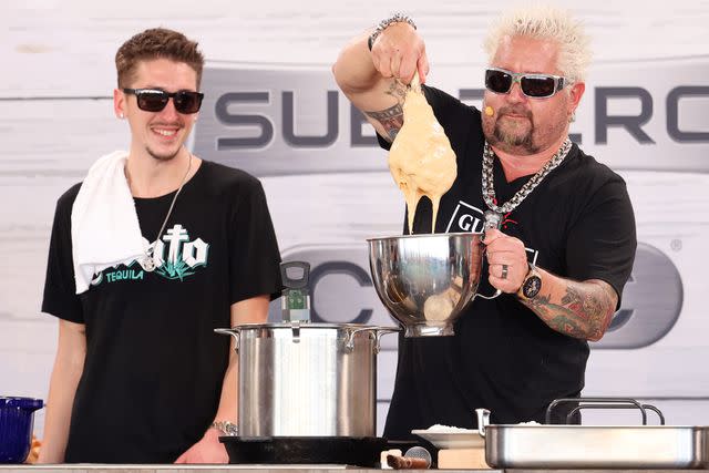 <p>Alexander Tamargo/Getty</p> Chef Hunter Fieri and Chef Guy Fieri are seen during the South Beach Wine and Food Festival in February 2022.