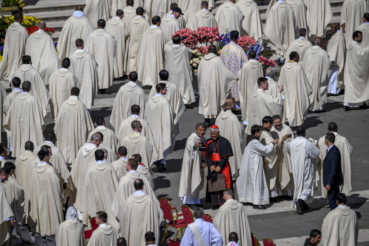 VATICAN CITY, VATICAN - APRIL 09: Clergy attend the Easter Mass at St. Peter's Square, on April 9, 2023 in Vatican City, Vatican. Following the liturgy, the Holy Father gave the traditional 'Blessing Urbi et Orbi'- to the city of Rome, and to the world. (Photo by Antonio Masiello/Getty Images)