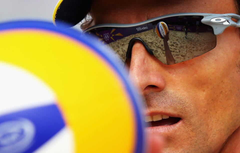 Emanuel Rego of Brazil prepares to serve during the Men's Beach Volleyball Round of 16 match between Brazil and Germany. (Getty Images)