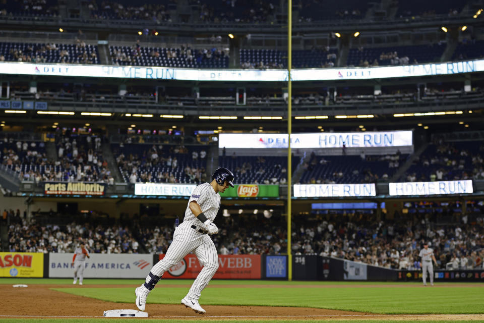 New York Yankees' Jasson Dominguez rounds third base after hitting a home run during the third inning of a baseball game against the Detroit Tigers, Wednesday, Sept. 6, 2023, in New York. (AP Photo/Adam Hunger)