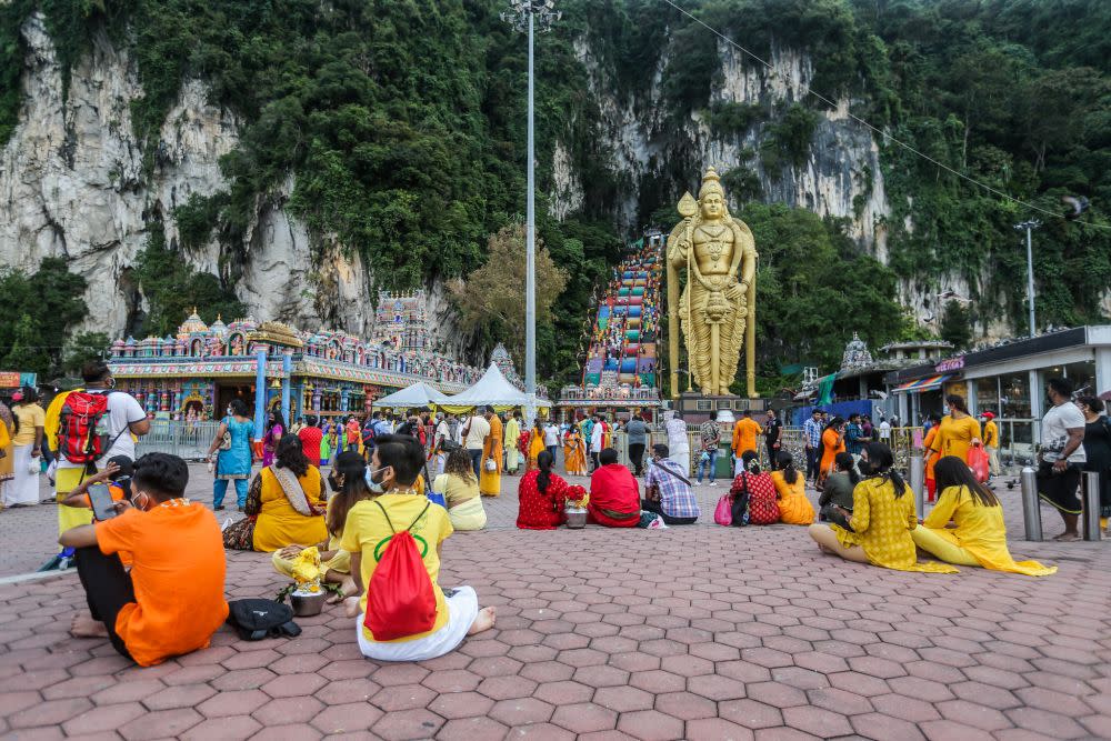 Hindu devotees observe standard operating procedures during Thaipusam at Batu Caves January 18, 2022. — Picture by Hari Anggara