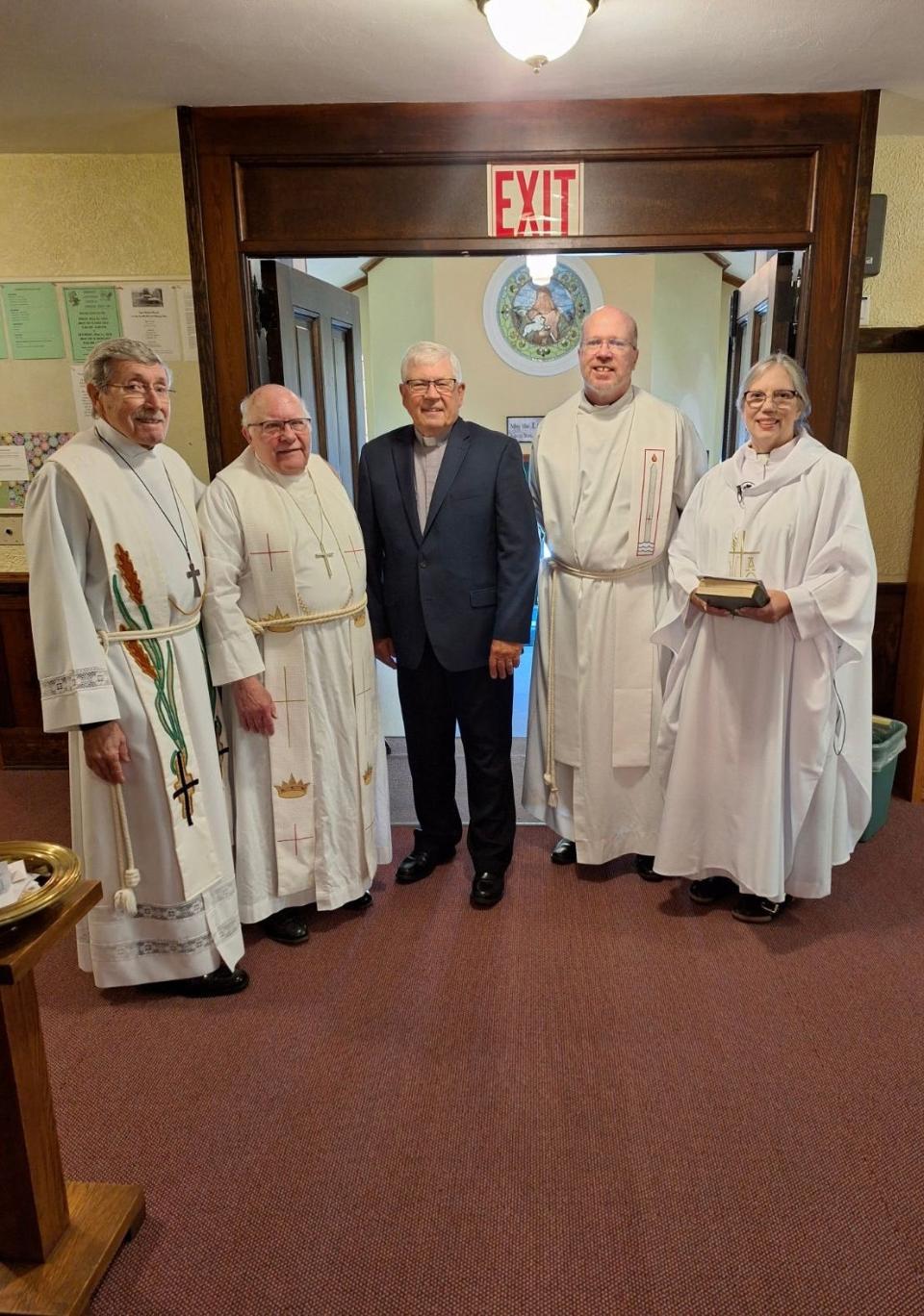 Emanuel Lutheran Church's 150th anniversary celebration included a reunion of former pastors Paul Bauman, Jim Rasmus, Kevin Scheuller and Robert Rosenberg alongside current pastor Carol Christianson.