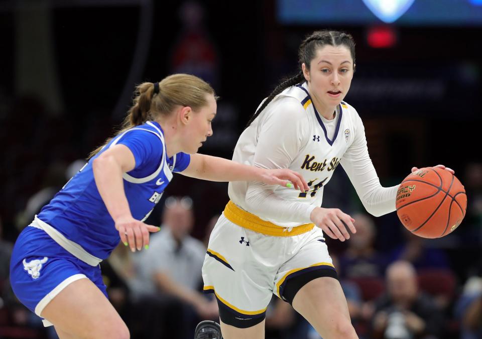 Kent State Golden Flashes guard Katie Shumate (14) drives during the first half of the Mid-American Conference Tournament womenÕs championship game at Rocket Mortgage FieldHouse, Saturday, March 16, 2024, in Cleveland, Ohio.
