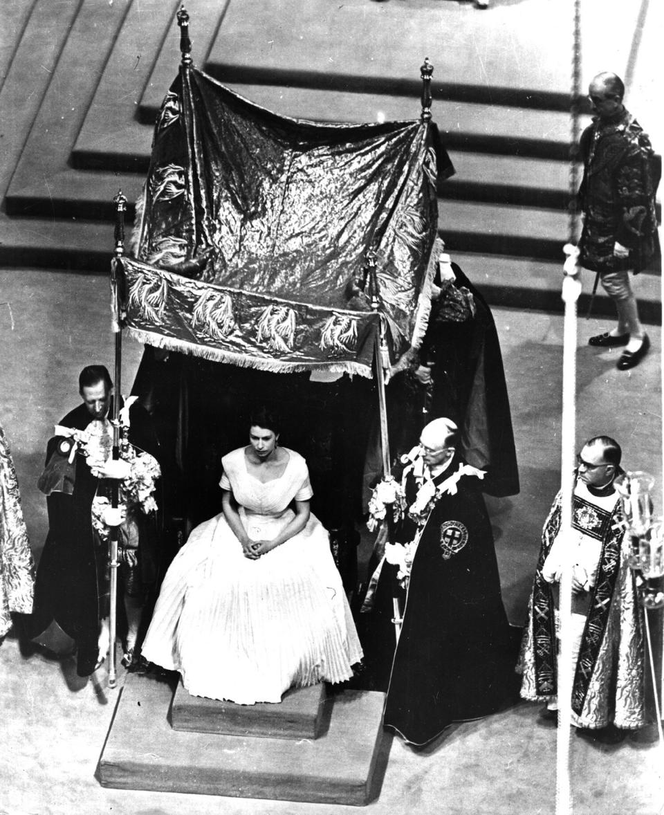 2nd June 1953: The canopy is placed over the Queen for the anointing ceremony during her coronation.