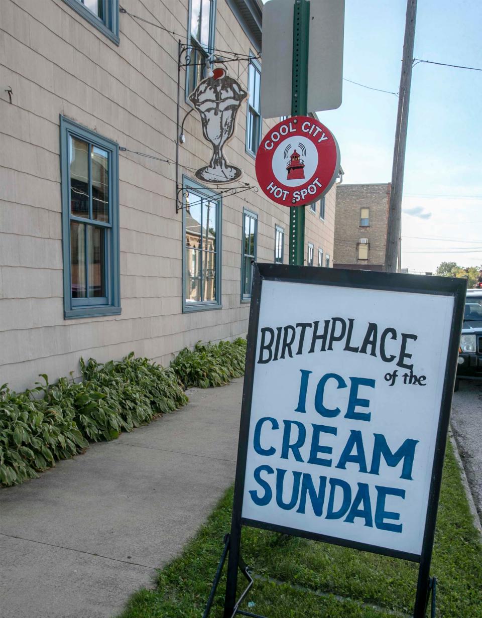 Signs at the Historic Washington House as seen, Wednesday, September 15, 2021, in Two Rivers, Wis. The firm is claimed to be the birth place of the Sundae.