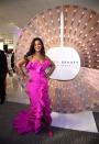 <p>In a fuchsia Calvin Klein strapless gown with ruffle trim for a fête at Sephora inside JCP in Brooklyn, New York.<br></p>