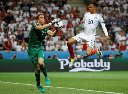 Football Soccer - England v Iceland - EURO 2016 - Round of 16 - Stade de Nice, Nice, France - 27/6/16 England's Dele Alli in action with Iceland's Hannes Halldorsson REUTERS/Eric Gaillard Livepic