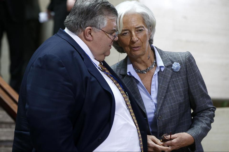 Agustín Carstens, exgobernador del Banco de México y nuevo director gerente del BPI, junto con <span>Christine Lagarde, directora gerente del Fondo Monetario Internacional </span>(AP Photo / Charles Dharapak)