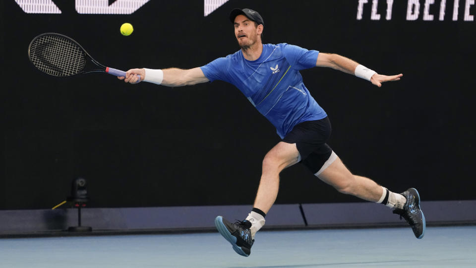 Andy Murray of Britain plays a forehand return to Taro Daniel of Japan during their second round match at the Australian Open tennis championships in Melbourne, Australia, Thursday, Jan. 20, 2022. (AP Photo/Simon Baker)
