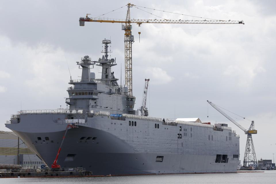 The Mistral-class helicopter carrier Vladivostok is seen at the STX Les Chantiers de l'Atlantique shipyard site in Saint-Nazaire, western France, April 24, 2014. The Vladivostok is due to be delivered to the Russian Navy in October. REUTERS/Stephane Mahe (FRANCE - Tags: MILITARY POLITICS BUSINESS)