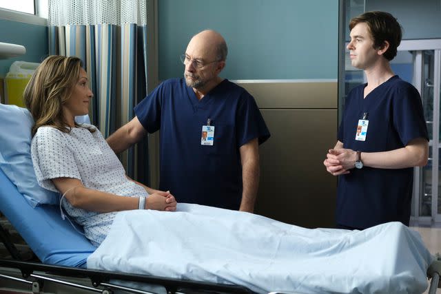 <p>Jeff Weddell/ABC via Getty</p> Christina Chang, Richard Schiff, and Freddie Highmore star in "The Good Doctor."