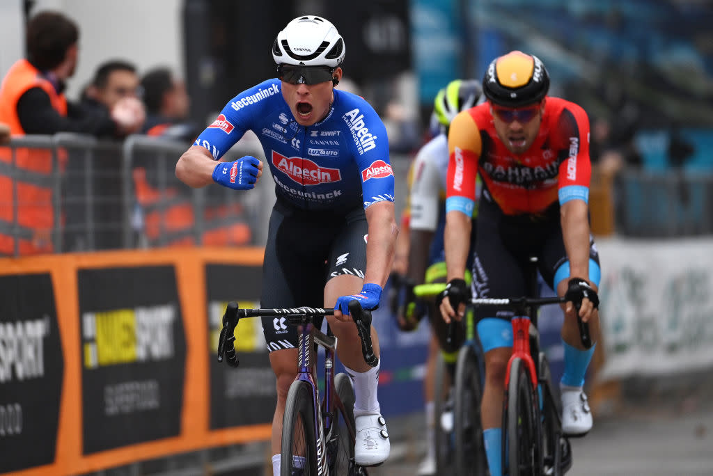  FOLIGNO ITALY  MARCH 08 Jasper Philipsen of Belgium and Team AlpecinDeceuninck celebrates at finish line as stage winner ahead of Phil Bauhaus of Germany and Team Bahrain Victorious during the 58th TirrenoAdriatico 2023 Stage 3 a 216km stage from Follonica to Foligno 231m  UCIWT  TirrenoAdriatico  on March 08 2023 in Foligno Italy Photo by Tim de WaeleGetty Images 