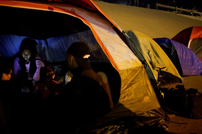 FILE PHOTO: Venezuelan migrants stand in a camp on the banks of the Rio Bravo river, in Ciudad Juarez