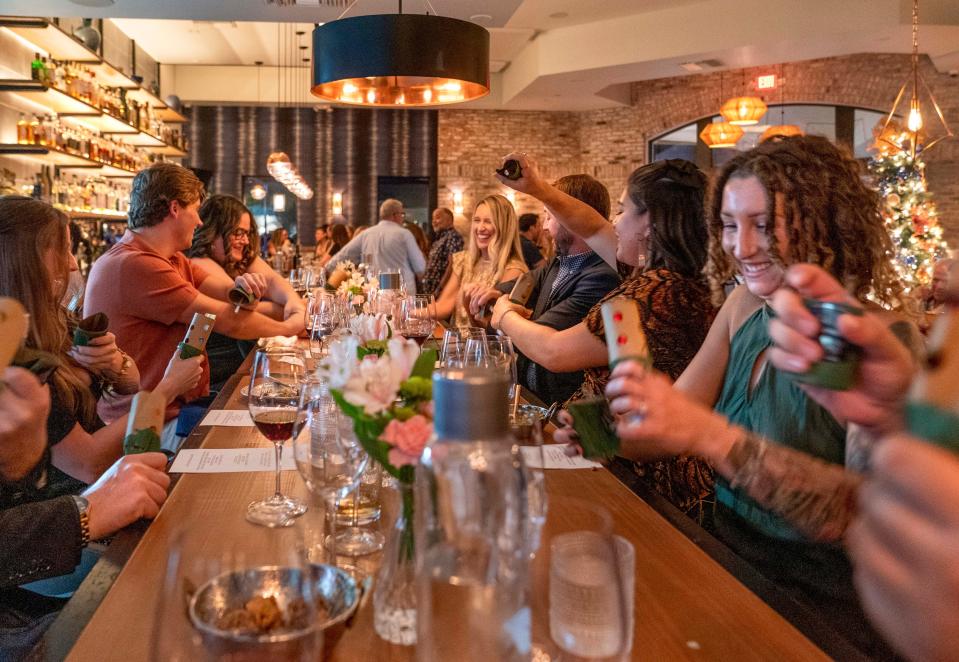 Guests dine at Stage Kitchen and Bar in Palm Beach Gardens.