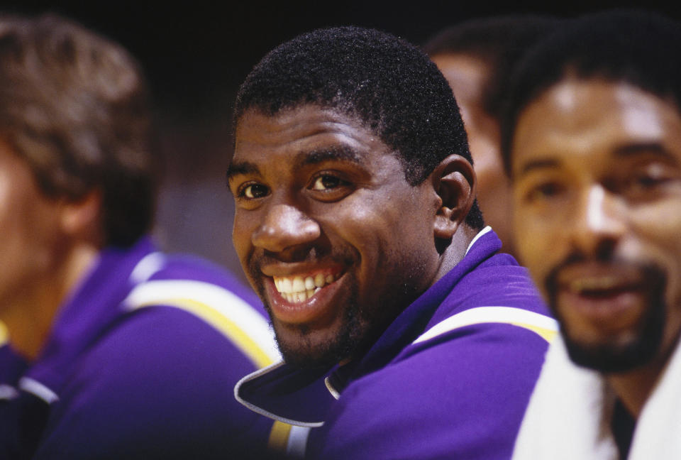 Magic Johnson played 13 seasons in the NBA, all with the Los Angeles Lakers.  / Credit: Getty Images