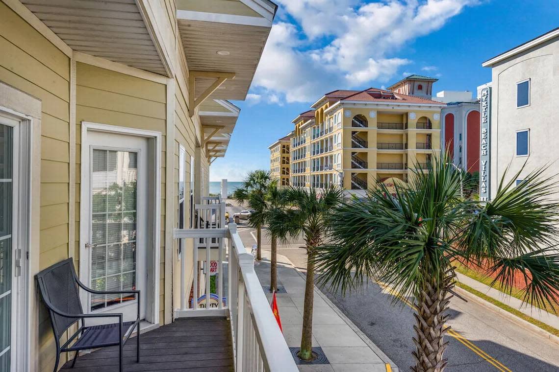 Balcony and exterior of the Motley Crew townhome in Central Myrtle Beach. Screenshot of listing. January 5, 2022.