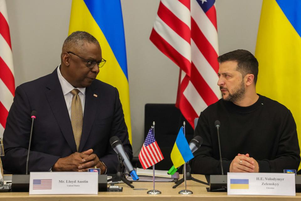 US Secretary Lloyd Austin (left) talks with President of Ukraine, Volodymyr Zelensky (POOL/AFP via Getty Images)
